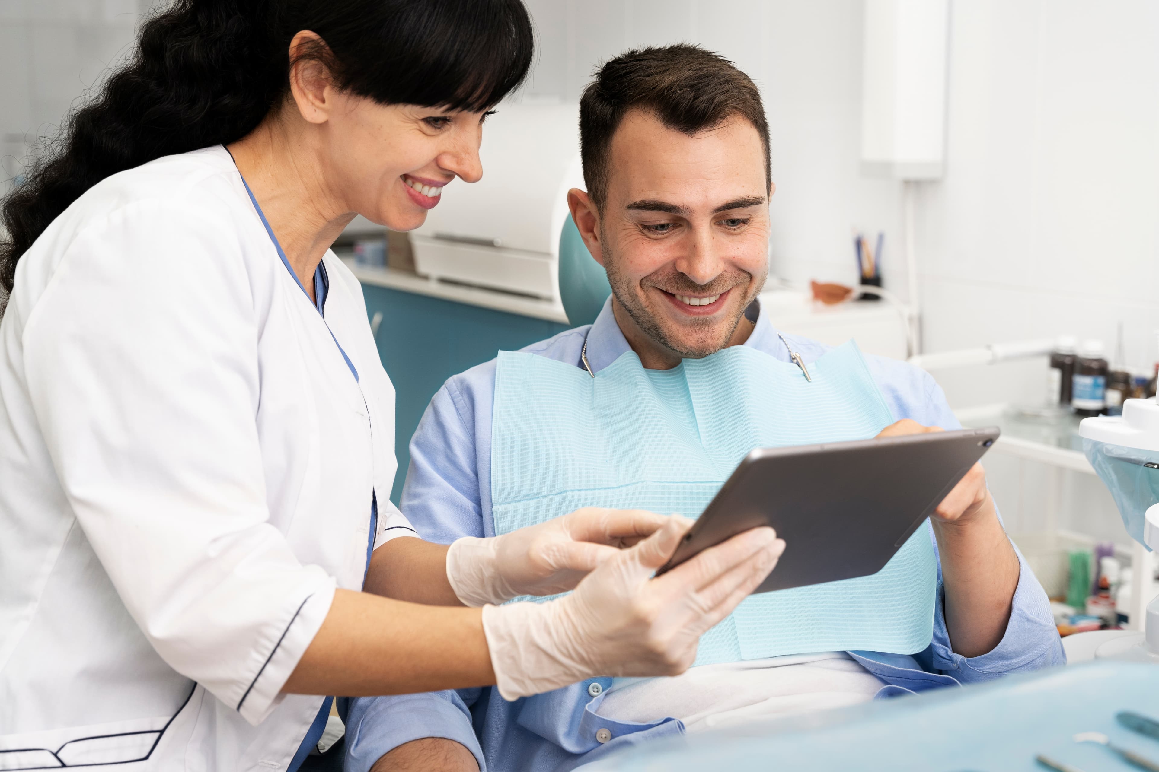 Dental professionals using tablet